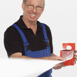 Employee holding a sample of sanstrap® stretchband in his hand.